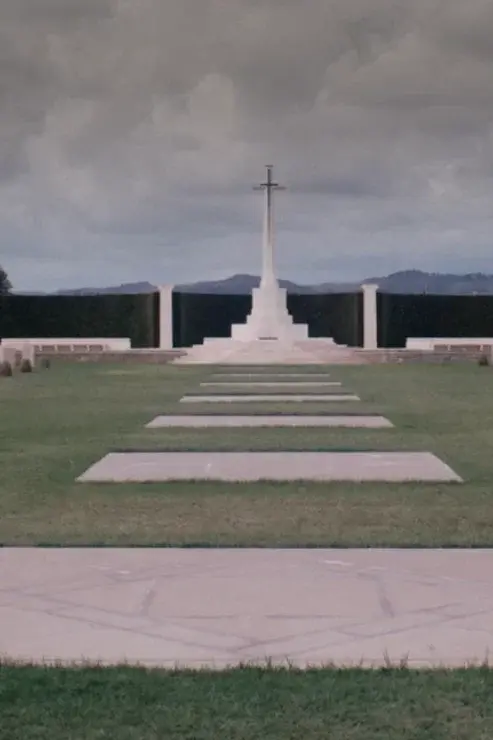 Poster for the film Lost Love, showing a war memorial cemetery in Sicily with a stone cross and rows of headstones